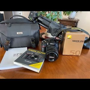 Nikon camera D7100 with two lenses,bag, tripod,accessories.